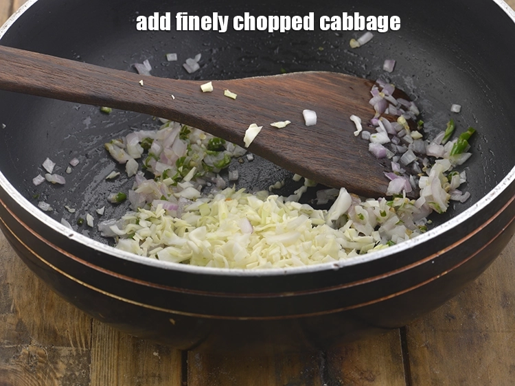 Step 21 – <p>Add the <span style="background-color:rgb(255,255,255);color:rgb(0,0,0);">1/4 cup finely </span><a href="https://www.tarladalal.com/glossary-cabbage-patta-gobi-kobi-248i#ing_2363"><u>chopped cabbage</u></a>. Make sure the cabbage is fresh …