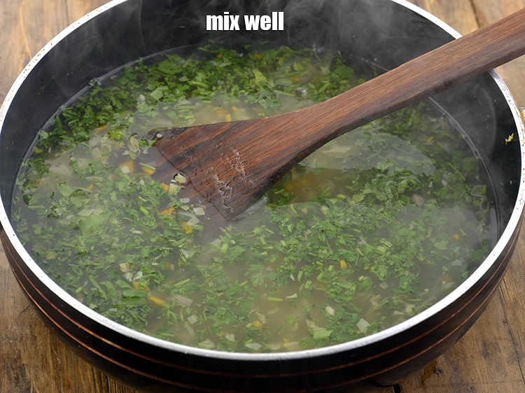 Step 29 – <p>Give the&nbsp;<strong>lemon and coriander soup</strong>&nbsp;a stir so that all the ingredients incorporate well.</p>