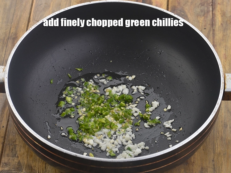 Step 17 – <p>Add the <span style="background-color:rgb(255,255,255);color:rgb(0,0,0);">2 tsp finely </span><a href="https://www.tarladalal.com/glossary-green-chillies-hari-mirch-331i#ing_2388"><u>chopped green chillies</u></a>. This will add zing to …