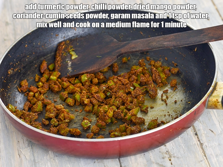 Step 9 – <p><span style="background-color:rgb(255,255,255);color:rgb(0,0,0);">Add the 1/4 tsp </span><a href="https://www.tarladalal.com/glossary-turmeric-powder-haldi-645i"><u>turmeric powder (haldi)</u></a><span style="background-color:rgb(255,255,255);color:rgb(0,0,0);">, 1 tsp </span><a href="https://www.tarladalal.com/glossary-chilli-powder-red-chilli-powder-339i"><u>chilli powder</u></a><span …