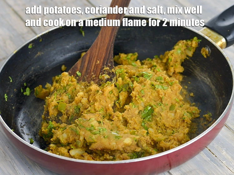 Step 10 – <p><span style="background-color:rgb(255,255,255);color:rgb(0,0,0);">Add the 2 cups boiled , peeled and </span><a href="https://www.tarladalal.com/glossary-potatoes-aloo-alu-batata-710i#ing_2516"><u>boiled and mashed potatoes</u></a><span style="background-color:rgb(255,255,255);color:rgb(0,0,0);">, …