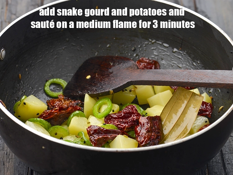 Step 2 – <p><span style="background-color:rgb(255,255,255);color:rgb(0,0,0);">Add the 1/2 cup </span><a href="https://www.tarladalal.com/glossary-snake-gourd-chichinda-743i#ing_2668"><u>sliced snake gourd</u></a><span style="background-color:rgb(255,255,255);color:rgb(0,0,0);"> and 1 cup </span><a href="https://www.tarladalal.com/glossary-potatoes-aloo-alu-batata-710i#ing_2328"><u>potato …