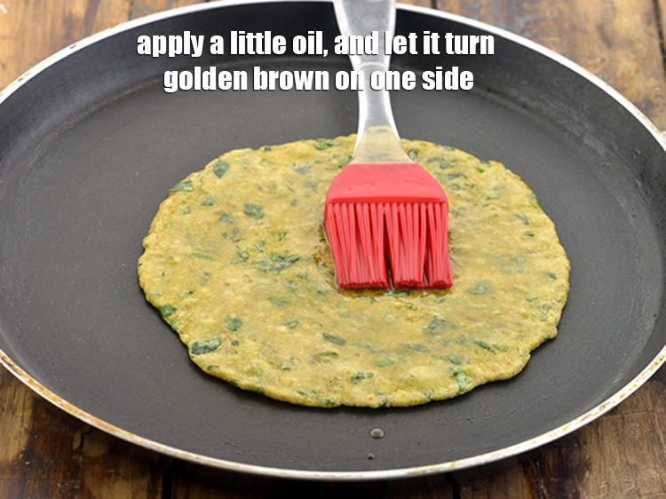 Step 13 – <p><span style="background-color:rgb(255,255,255);color:rgb(0,0,0);">Apply a little </span><a href="https://www.tarladalal.com/glossary-oil-671i"><u>oil</u></a><span style="background-color:rgb(255,255,255);color:rgb(0,0,0);">, and let it turn golden brown on one …