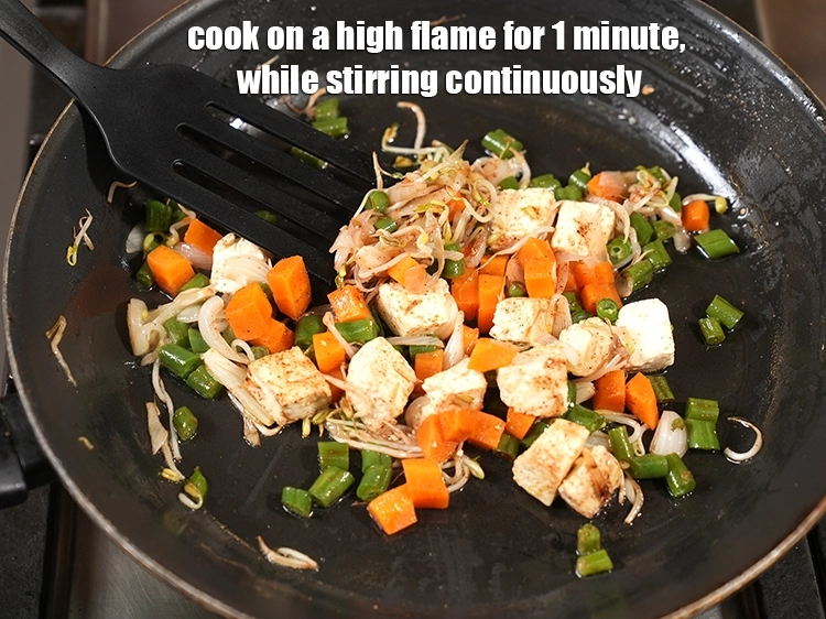 Step 14 – <p>Cook on a high flame for 1 minute, while stirring continuously.</p>