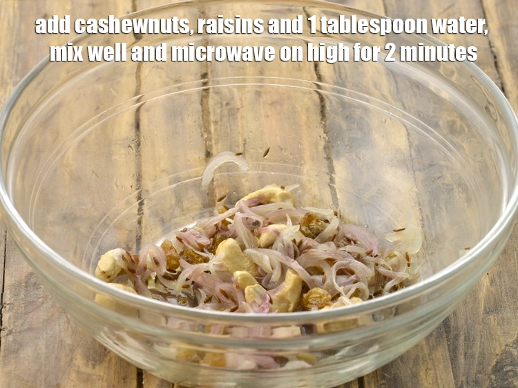 Step 3 – <p><span style="background-color:rgb(255,255,255);color:rgb(0,0,0);">Add the 1 tbsp </span><a href="https://www.tarladalal.com/glossary-cashew-nuts-kaju-840i"><u>cashew nuts (kaju)</u></a><span style="background-color:rgb(255,255,255);color:rgb(0,0,0);">, 2 tsp </span><a href="https://www.tarladalal.com/glossary-raisins-kishmish-kismis-597i"><u>raisins (kismis)</u></a><span …