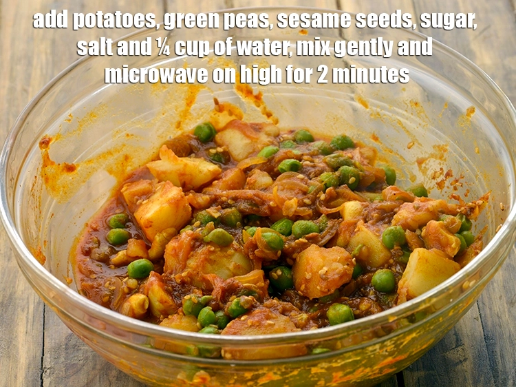 Step 5 – <p><span style="background-color:rgb(255,255,255);color:rgb(0,0,0);">Add the 1 cup </span><a href="https://www.tarladalal.com/glossary-potatoes-aloo-alu-batata-710i#ing_2605"><u>boiled potato cubes</u></a><span style="background-color:rgb(255,255,255);color:rgb(0,0,0);">, 1/2 cup </span><a href="https://www.tarladalal.com/glossary-green-peas-matar-hare-matar-vatana-180i#ing_2431"><u>boiled green …