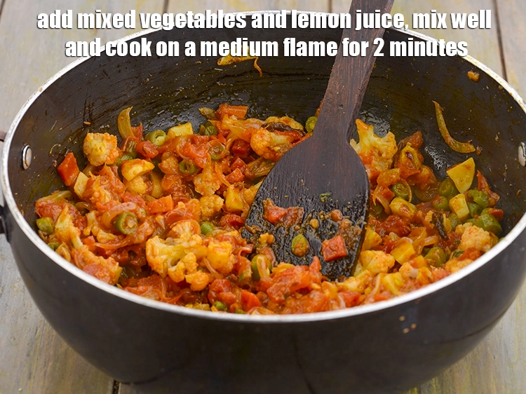 Step 5 – <p><span style="background-color:rgb(255,255,255);color:rgb(0,0,0);">Add the 1 cup </span><a href="https://www.tarladalal.com/glossary-mixed-vegetables-mixed-sabzi-723i#ing_2543"><u>chopped and boiled mixed vegetables</u></a><span style="background-color:rgb(255,255,255);color:rgb(0,0,0);"> and 1 tsp …