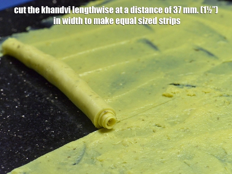 Step 3 – <p><span style="background-color:rgb(255,255,255);color:rgb(0,0,0);">Cut the <strong>khandvi</strong> lengthwise at a distance of 37 mm. (1½”) in width to …