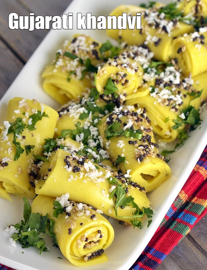 Step 8 – <p><span style="background-color:rgb(255,255,255);color:rgb(0,0,0);">Serve <strong>microwave khandvi recipe | Gujarati khandvi recipe in microwave</strong> immediately.</span></p>