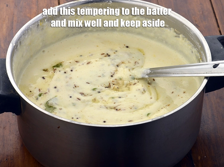 Step 22 – <p><span style="background-color:rgb(255,255,255);color:rgb(0,0,0);">Add this <strong>tempering</strong> <strong>to the batte</strong>r and mix well and keep aside.</span></p>