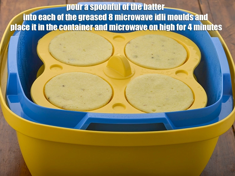Step 24 – <p><span style="background-color:rgb(255,255,255);color:rgb(0,0,0);">Grease the <strong>microwave safe idli</strong> <strong>stand</strong> and pour a spoonful of the batter into …