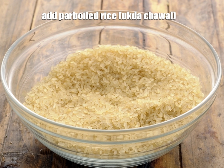 Step 6 – <p>Add <span style="background-color:rgb(255,255,255);color:rgb(0,0,0);">1/2 cup </span><a href="https://www.tarladalal.com/glossary-parboiled-rice-ukda-chawal-538i"><u>parboiled rice (ukda chawal)</u></a><u>.</u></p>