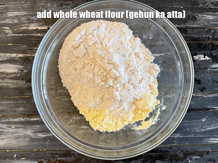 Step 4 – <p>Add <span style="background-color:rgb(255,255,255);color:rgb(0,0,0);">1 cup </span><a href="https://www.tarladalal.com/glossary-whole-wheat-flour-gehun-ka-atta-gehun-ka-aata-429i"><u>whole wheat flour (gehun ka atta)</u></a><u>.</u></p>