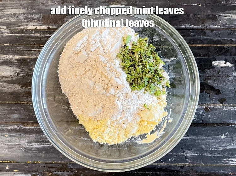 Step 5 – <p>Add <span style="background-color:rgb(255,255,255);color:rgb(0,0,0);">1/4 cup finely </span><a href="https://www.tarladalal.com/glossary-mint-leaves-pudina-phudina-521i#ing_2368"><u>chopped mint leaves (phudina) </u></a><span style="background-color:rgb(255,255,255);color:rgb(0,0,0);">leaves.</span></p>