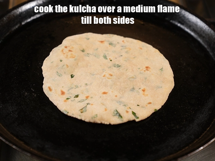 Step 21 – <p>Cook the <strong>kulcha</strong> over a medium flame till both sides.</p>