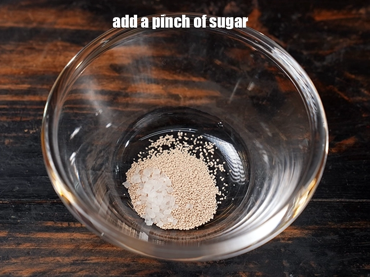 Step 3 – <p><span style="background-color:rgb(255,255,255);color:rgb(0,0,0);">Add a pinch of </span><a href="https://www.tarladalal.com/glossary-sugar-chini-shakkar-278i"><u>sugar</u></a>.</p>