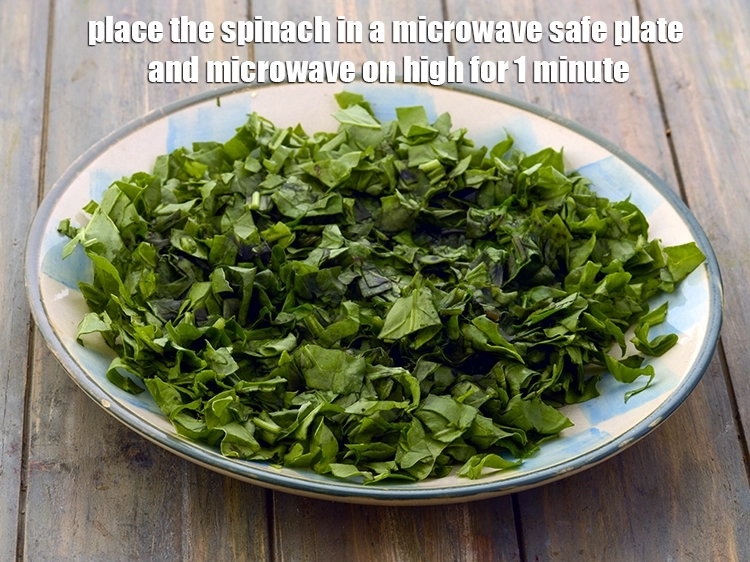 Step 2 – <p><span style="background-color:rgb(255,255,255);color:rgb(0,0,0);">Place the 3 cups </span><a href="https://www.tarladalal.com/glossary-spinach-palak-255i#ing_2362"><u>chopped spinach (palak)</u></a><span style="background-color:rgb(255,255,255);color:rgb(0,0,0);"> in a microwave safe plate …