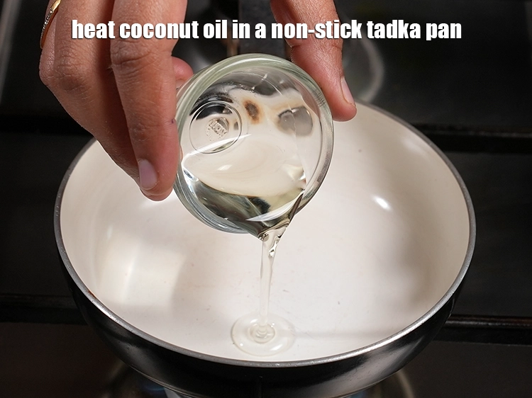 Step 11 – <p><span style="background-color:rgb(255,255,255);color:rgb(0,0,0);">For the <strong>tempering</strong>, heat the </span><span style="background-color:rgb(255,255,255);color:rgb(13,13,13);">1 tbsp </span><a href="https://www.tarladalal.com/glossary-coconut-oil-nariyal-ka-tel-1186i"><u>coconut oil</u></a><span style="background-color:rgb(255,255,255);color:rgb(13,13,13);"> any other …