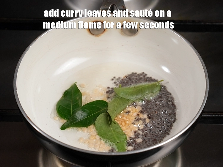 Step 14 – <p><span style="background-color:rgb(255,255,255);color:rgb(0,0,0);">Add 5 </span><a href="https://www.tarladalal.com/glossary-curry-leaves-kadi-patta-kadipatta-388i"><u>curry leaves (kadi patta)</u></a><u>. </u><span style="background-color:rgb(255,255,255);color:rgb(0,0,0);">and sauté on a medium flame …