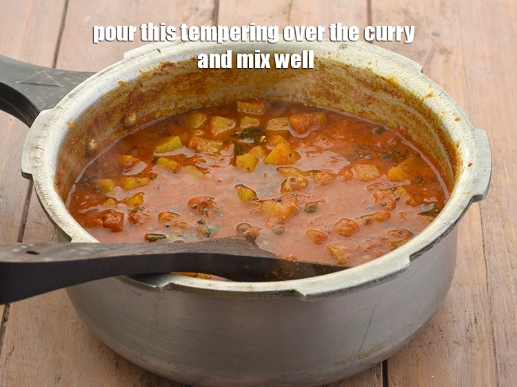 Step 15 – <p><span style="background-color:rgb(255,255,255);color:rgb(0,0,0);">Pour this <strong>tempering</strong> over the curry and mix well.</span></p>