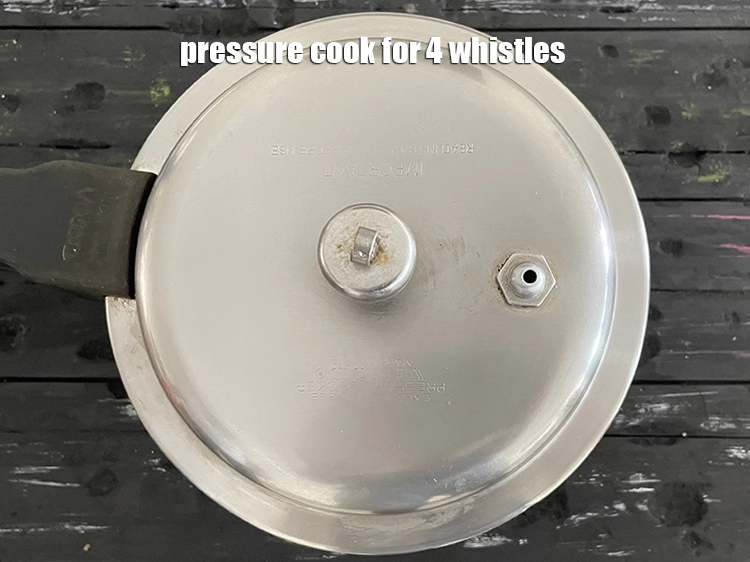 Step 7 – <p><span style="background-color:rgb(255,255,255);color:rgb(0,0,0);">Pressure cook for 4 whistles.</span></p>