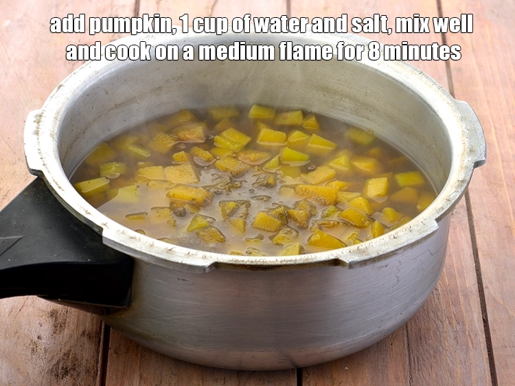 Step 9 – <p><span style="background-color:rgb(255,255,255);color:rgb(0,0,0);">Add the 2 1/2 cups </span><a href="https://www.tarladalal.com/glossary-red-pumpkin-kaddu-lal-bhopla-bhopla-595i#ing_2381"><u>chopped red pumpkin (bhopla / kaddu)</u></a><span style="background-color:rgb(255,255,255);color:rgb(0,0,0);">, 1 …