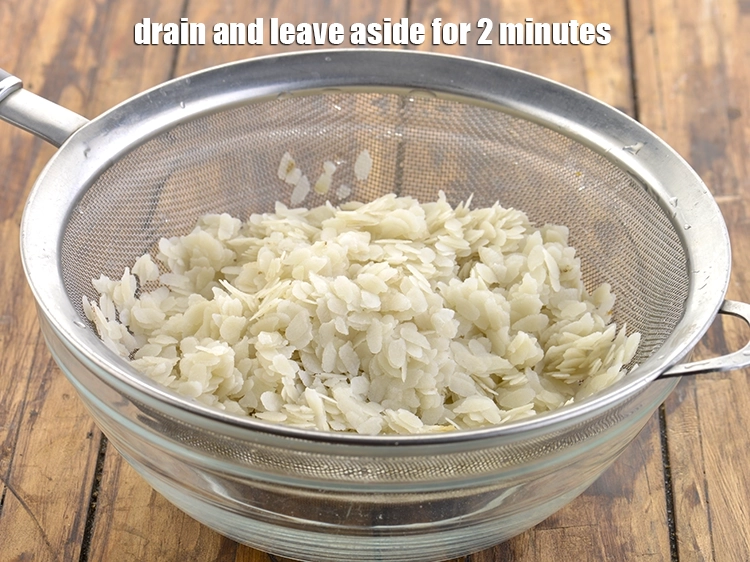 Step 14 – <html><head><meta charset="UTF-8"> </head><body><p><strong>Drain</strong> and leave aside for 2&nbsp;minutes.</p></body></html>