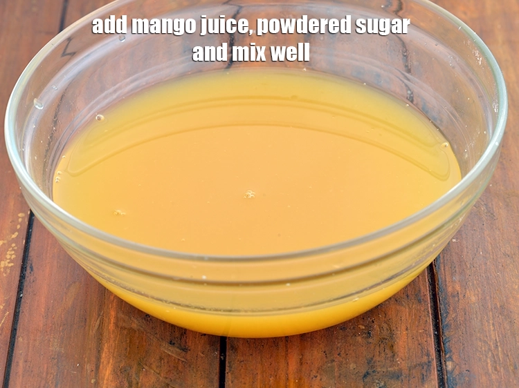 Step 3 – <p>Add <span style="background-color:rgb(255,255,255);color:rgb(0,0,0);">1/2 cup readymade </span><a href="https://www.tarladalal.com/glossary-mango-aam-kairi-138i#ing_3392"><u>mango juice</u></a><u>, </u><span style="background-color:rgb(255,255,255);color:rgb(0,0,0);">1 1/2 tbsp </span><a href="https://www.tarladalal.com/glossary-powdered-sugar-280i"><u>powdered sugar</u></a><u> …