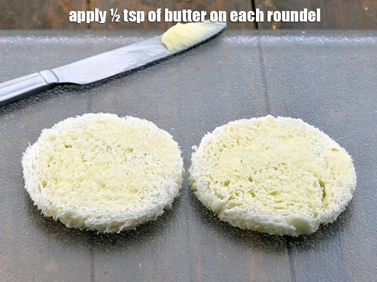 Step 3 – <p><span style="background-color:rgb(255,255,255);color:rgb(0,0,0);">Place 2 </span><a href="https://www.tarladalal.com/glossary-bread-219i#ing_3515"><u>bread slices</u></a><span style="background-color:rgb(255,255,255);color:rgb(0,0,0);"> roundels on a clean dry surface and apply …