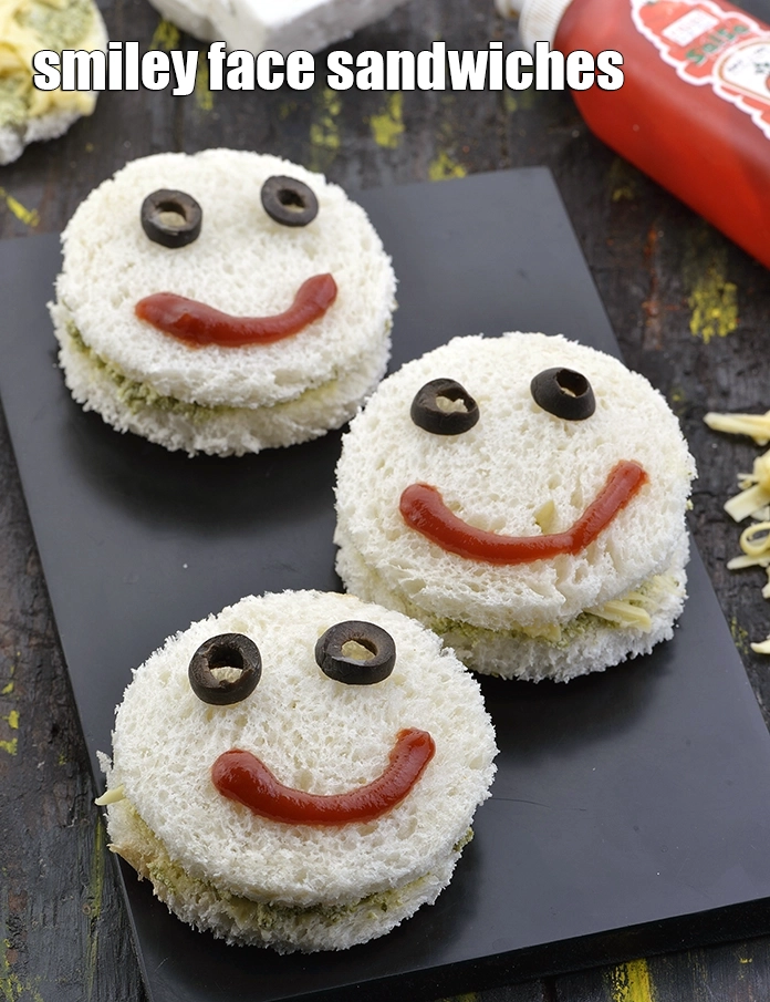 Step 9 – <p><span style="background-color:rgb(255,255,255);color:rgb(0,0,0);">Serve <strong>Smiley Face Sandwiches</strong> immediately.</span></p>