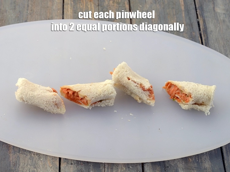 Step 7 – <p><span style="background-color:rgb(255,255,255);color:rgb(0,0,0);">Cut each <strong>pinwheel</strong> into 2 equal portions diagonally.</span></p>