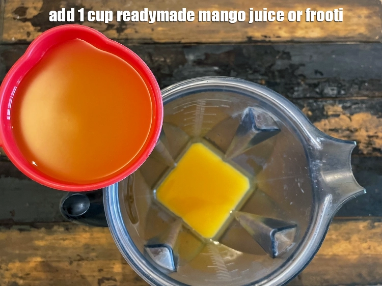 Step 5 – <html><head></head><body><p>Add&nbsp;1 cup&nbsp;readymade&nbsp;<a href="glossary-mango-juice-aam-ka-juice-aam-ka-ras-143i">mango juice</a>&nbsp;or&nbsp;<a href="glossary-frooti-1446i">frooti</a>.</p></body></html>