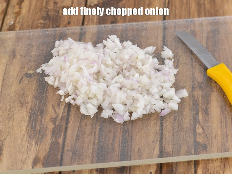 Step 26 – <p>Add <span style="background-color:rgb(255,255,255);color:rgb(0,0,0);">1/2 cup finely </span><a href="https://www.tarladalal.com/glossary-onions-pyaz-pyaaz-kanda-548i#ing_2327"><u>chopped onion</u></a>. If you are Jain, you can replace …