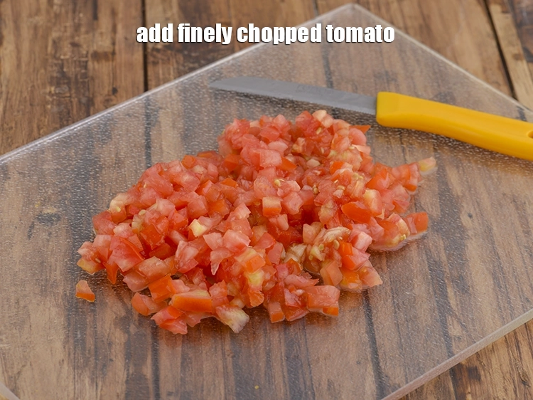 Step 27 – <p>Add <span style="background-color:rgb(255,255,255);color:rgb(0,0,0);">1/2 cup finely </span><a href="https://www.tarladalal.com/glossary-tomatoes-tamatar-639i#ing_2361"><u>chopped tomato</u></a>.&nbsp;</p>