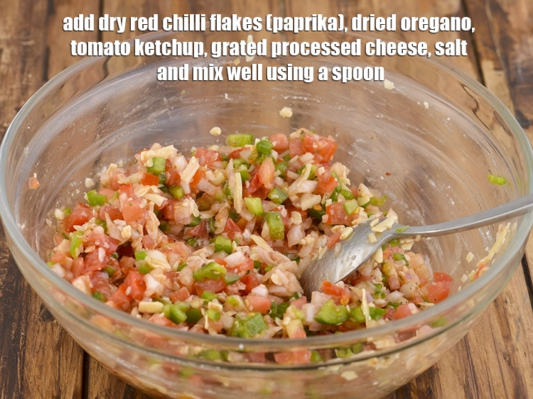 Step 29 – <p>Add <span style="background-color:rgb(255,255,255);color:rgb(0,0,0);">1/4 tsp </span><a href="https://www.tarladalal.com/glossary-dry-red-chilli-flakes-paprika-338i"><u>dry red chilli flakes (paprika)</u></a>, <span style="background-color:rgb(255,255,255);color:rgb(0,0,0);">1/2 tsp </span><a href="https://www.tarladalal.com/glossary-dried-oregano-268i"><u>dried …