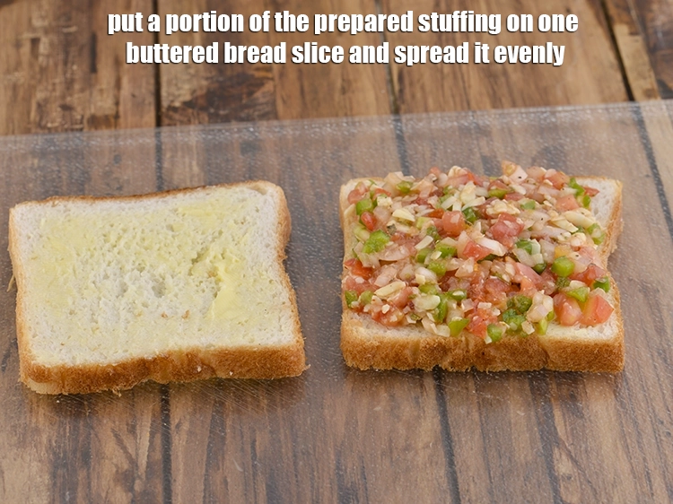 Step 31 – <p>Put a portion of the <strong>prepared stuffing</strong> on one buttered bread slice and spread it …