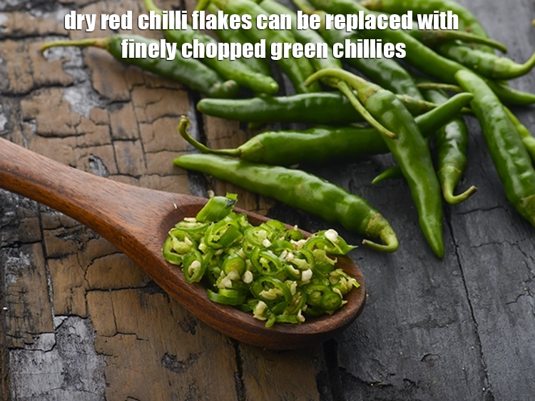 Step 40 – <p><span style="background-color:rgb(255,255,255);color:rgb(0,0,0);">Dry red chilli flakes can be replaced with <strong>finely</strong> <strong>chopped green chillies</strong>.</span></p>