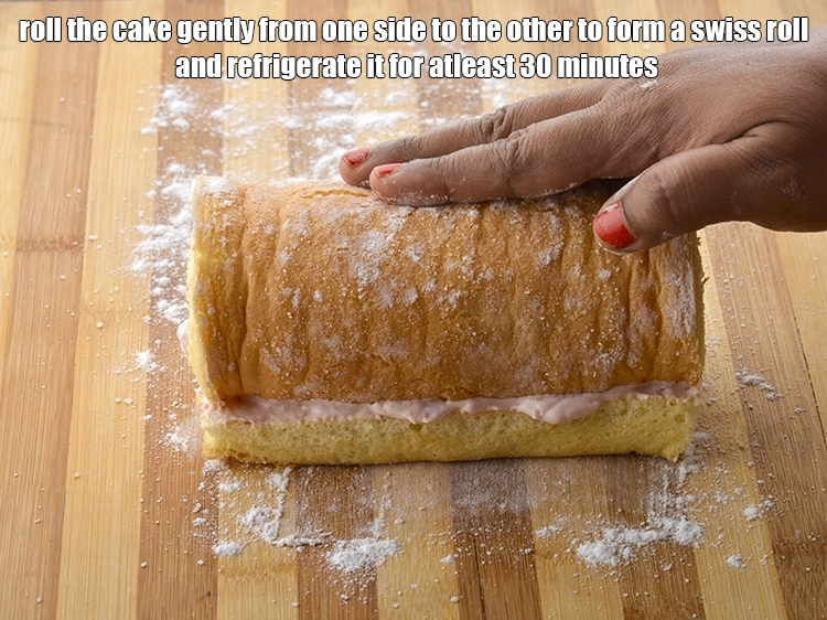 Step 12 – <p><span style="background-color:rgb(255,255,255);color:rgb(0,0,0);">Roll the cake gently from one side to the other to form a <strong>swiss …