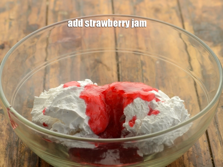 Step 2 – <p>Add <span style="background-color:rgb(255,255,255);color:rgb(0,0,0);">1 tbsp </span><a href="https://www.tarladalal.com/glossary-strawberry-jam-243i"><u>strawberry jam</u></a><u>.</u></p>