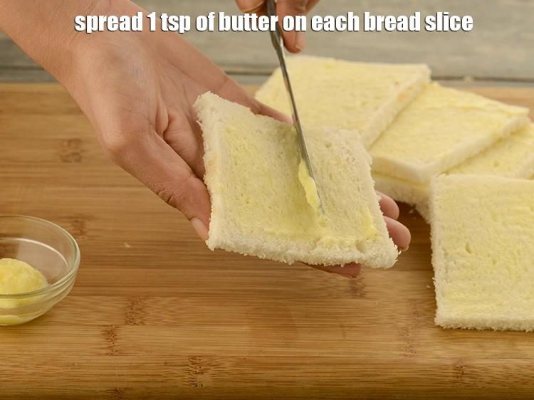 Step 18 – <p>Spread 1 tsp of&nbsp;<a href="https://www.tarladalal.com/glossary-butter-makhan-233i">butter</a>&nbsp;on each bread slice. Ensure the butter has been removed from …