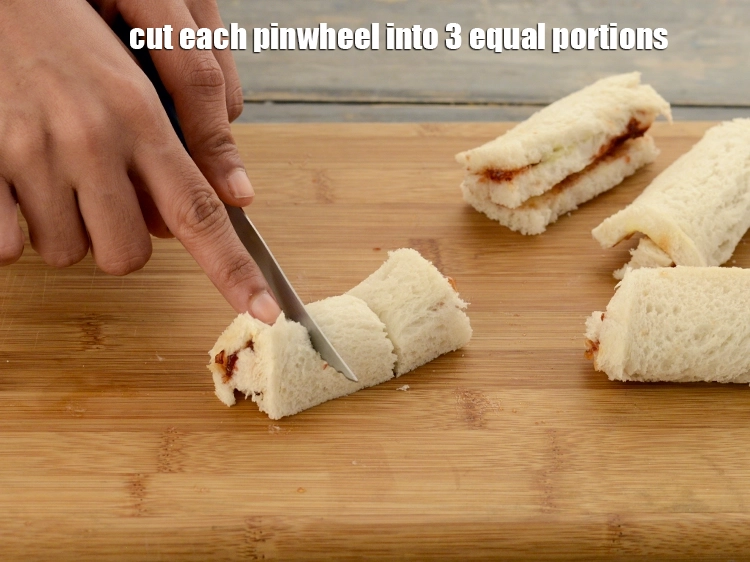 Step 21 – <p>Cut each pinwheel into 3 equal portions.</p>