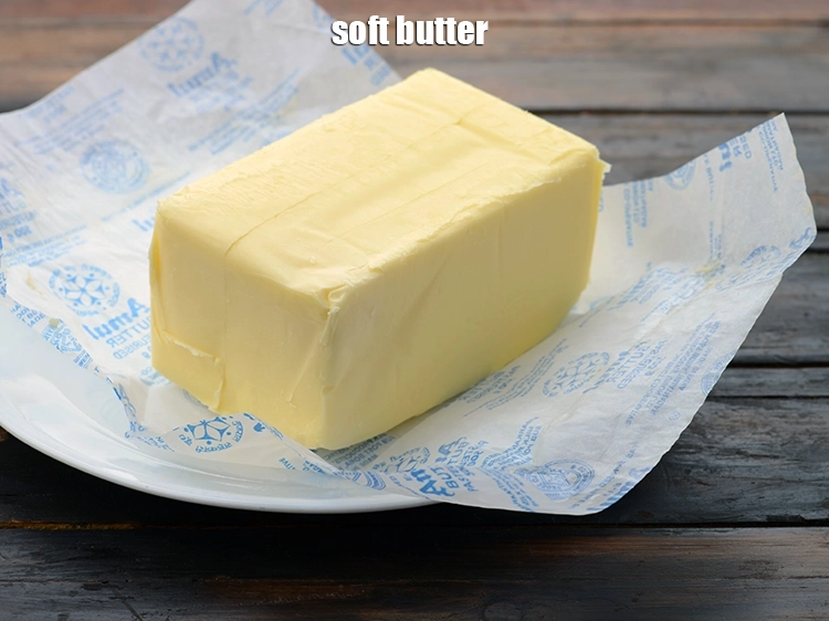 Step 25 – <p><span style="background-color:rgb(255,255,255);color:rgb(0,0,0);">Ensure the </span><a href="https://www.tarladalal.com/glossary-butter-makhan-233i"><strong><u>butter</u></strong></a><span style="background-color:rgb(255,255,255);color:rgb(0,0,0);"> has been removed from the refrigerator well in advance …