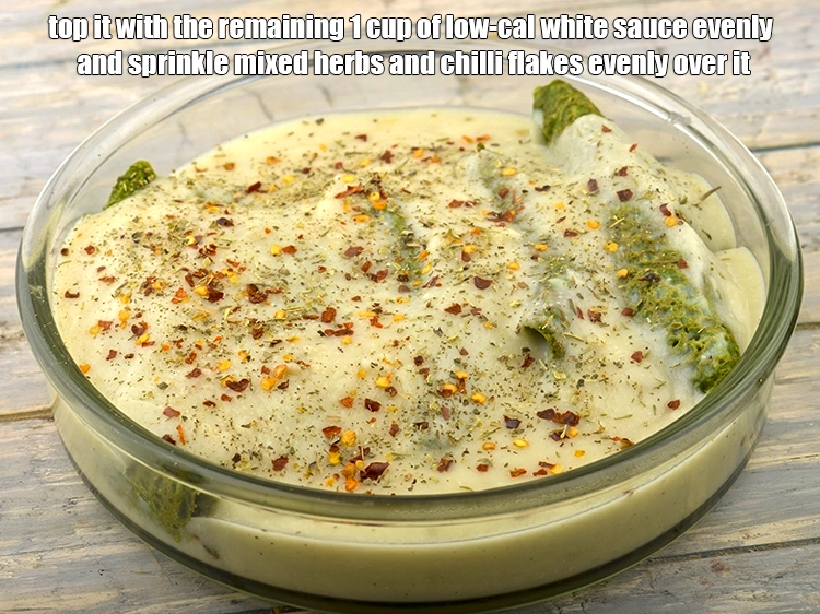 Step 15 – <p>Top it with the remaining 1 cup of <a href="https://www.tarladalal.com/low-calorie-white-sauce--diabetic-recipe-35331r">low-cal white sauce</a> evenly and sprinkle …
