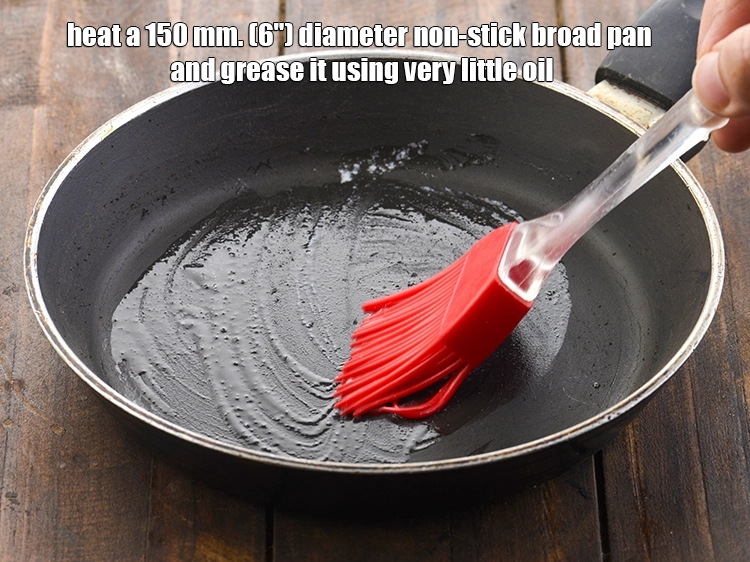 Step 3 – <p><span style="color:rgb(13,13,13);">Heat a 150 mm. (6") diameter non-stick broad pan and grease it using very …