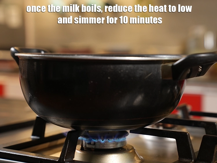 Step 3 – <p>Once the milk boils, reduce the heat to low and simmer for 10 minutes.</p>
