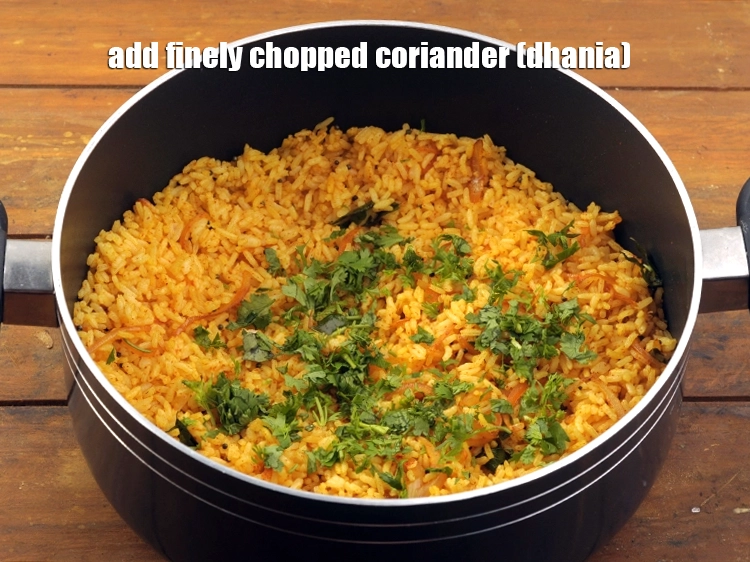 Step 19 – <p>Add 2 tbsp&nbsp;finely&nbsp;<a href="https://www.tarladalal.com/glossary-chopped-coriander-783i">chopped coriander (dhania)</a>.&nbsp;</p>
