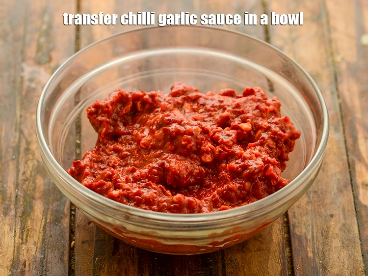 Step 14 – <p>Transfer <strong>chilli garlic sauce</strong> in a bowl.</p>