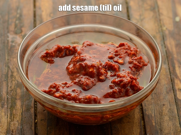 Step 15 – <p>Add the <span style="background-color:rgb(255,255,255);color:rgb(0,0,0);">2 tbsp </span><a href="https://www.tarladalal.com/glossary-sesame-oil-til-oil-gingely-oil-til-ka-tel-1032i"><u>sesame (til) oil</u></a>. It enhances the flavor and gives …
