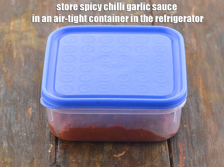 Step 20 – <p>Store <strong>spicy chilli garlic sauce</strong> in an air-tight container in the refrigerator and use as …