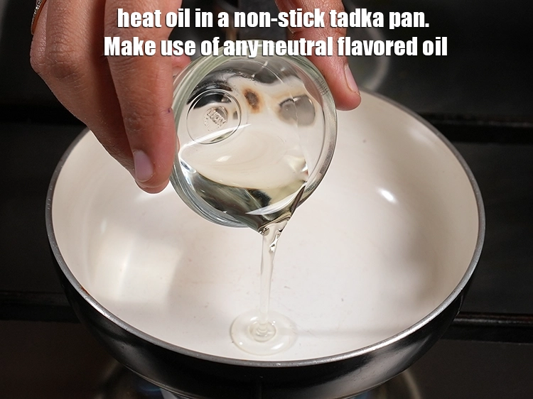 Step 9 – <p>For the tempering of nariyal ki chutney, heat <span style="background-color:rgb(255,255,255);color:rgb(0,0,0);">1 tsp </span><a href="https://www.tarladalal.com/glossary-oil-671i"><u>oil</u></a> in a …